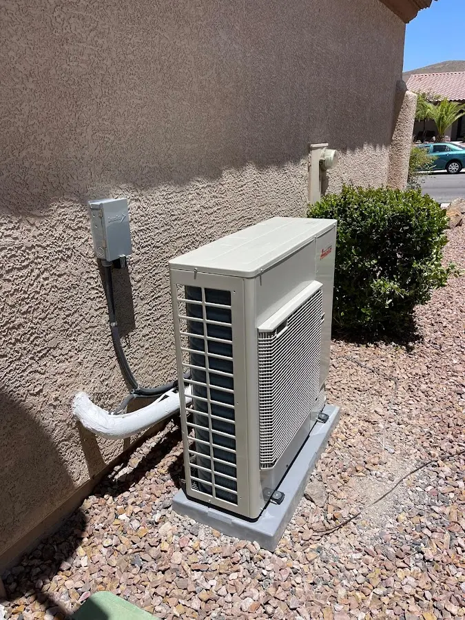 Residential air conditioning condenser unit in Alpena